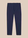 Back view of navy Castore golf winter trousers with branding on the back pocket