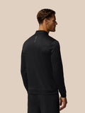 Back view of man in black Golf Club Classic top with all over print and Castore branding down the back