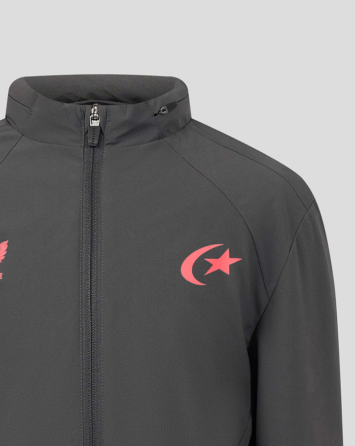 Grey Saracens junior training shower jacket with pink crest on the left chest and pink crescent and star on the right.