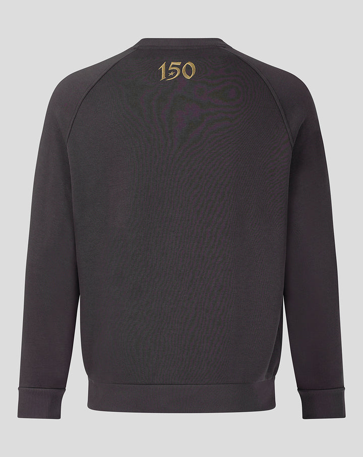 Back view of dark grey travel fleece sweatshirt with gold 150 emblem near the neckline.