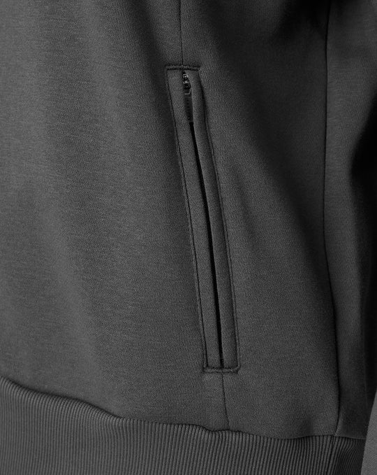 Close up of vertical zip pocket on front of dark grey Saracens travel hoodie
