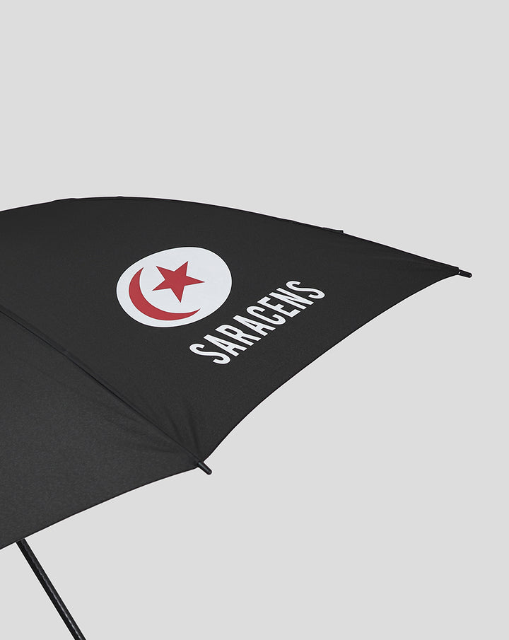 Close up of black Saracens umbrella canopy with circular logo and Saracens text