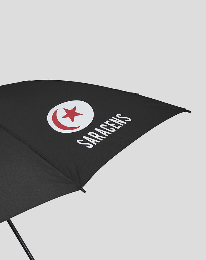 Close up of black Saracens umbrella canopy with circular logo and Saracens text