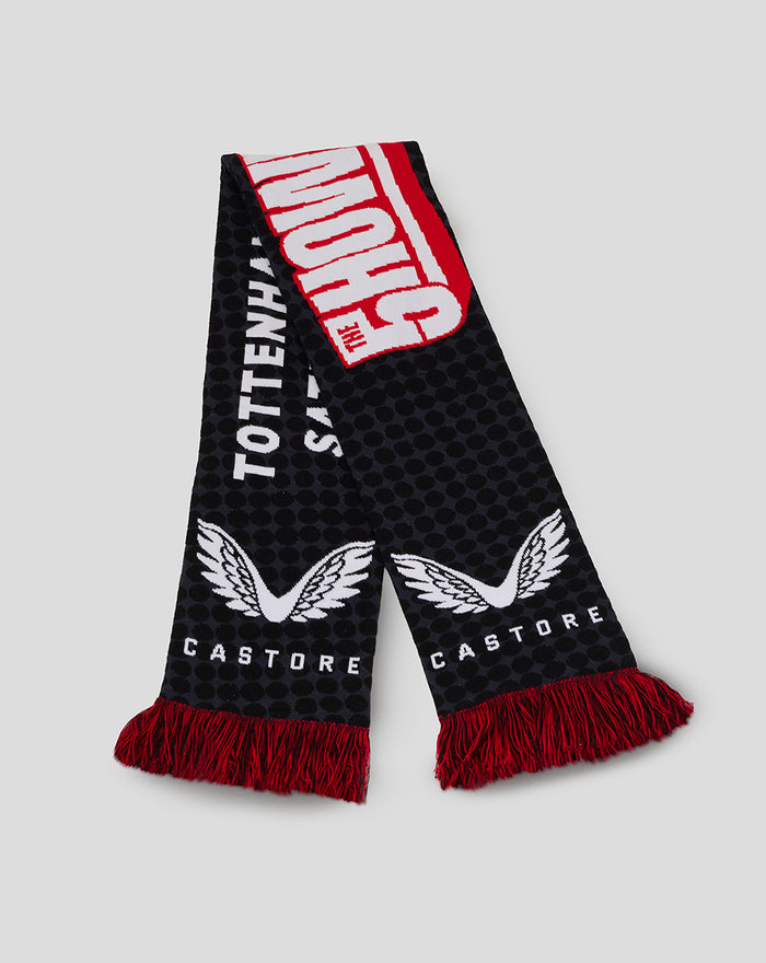 Showdown 25 scarf in black with white wing emblem, Castore branding, and red fringe.