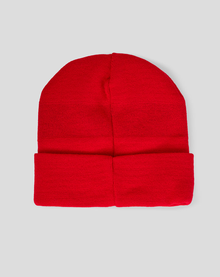Red knit beanie with folded cuff and a visible center crown seam