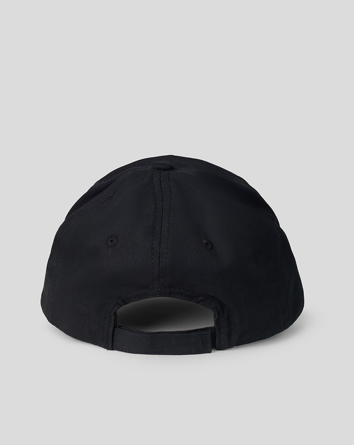 Back view of black cap showing an adjustable strap.