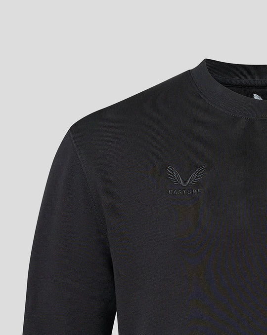 Detail of tonal Castore logo embroidery on the chest of the black Saracens sweatshirt.