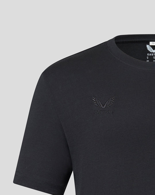 Close up of black T-shirt chest area with tonal embroidered Saracens crest and Castore branding