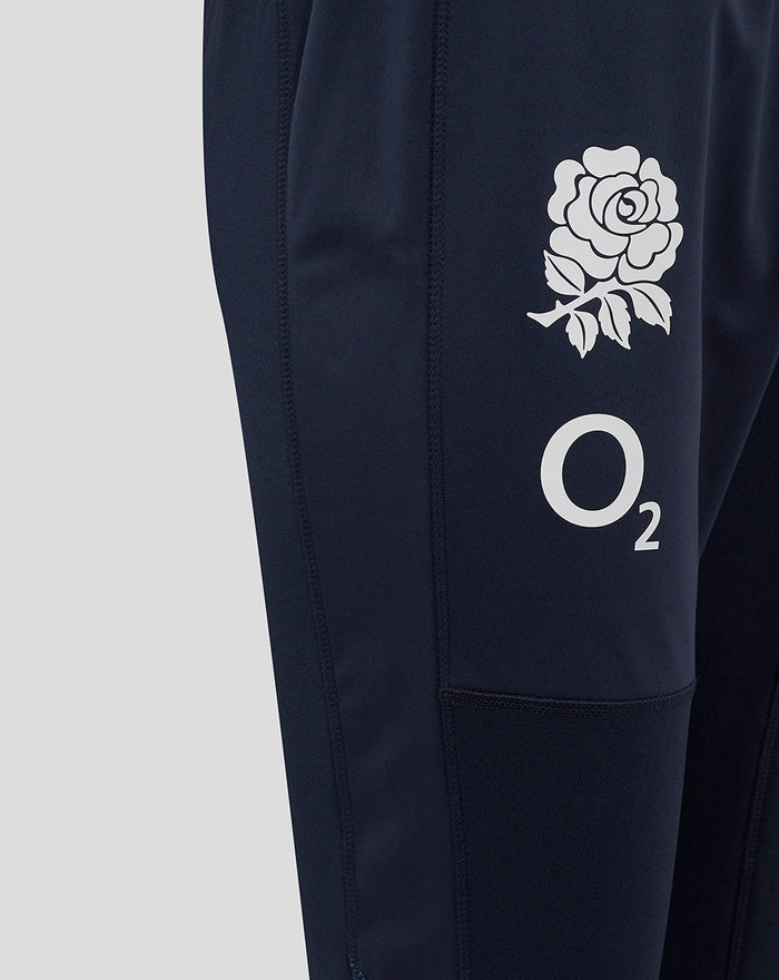 Navy drill pants thigh area showing white rose crest above the O2 logo