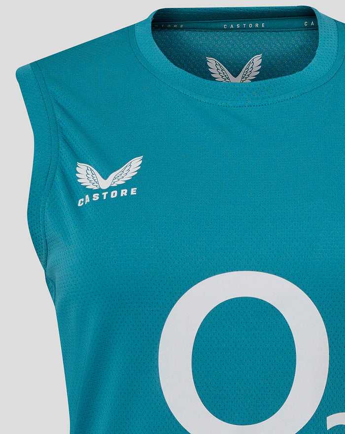 Close-up of neckline and chest with Castore branding and white rose crest on storm blue sleeveless Rugby tee