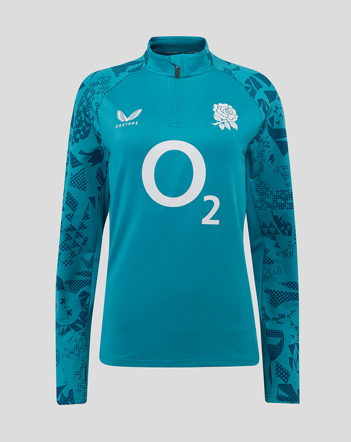 Women’s storm blue England rugby performance long sleeve midlayer with funnel neck and quarter zip, patterned sleeves, rose crest left chest, O2 logo center, Castore logo right chest.