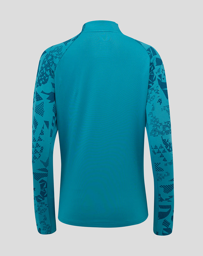 Back view of storm blue Women’s England Rugby performance long sleeve midlayer top with abstract print on sleeves and side panels