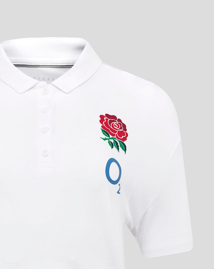 Front view of white England Rugby Travel Short Sleeve Polo with crest on left chest and Castore branding on right chest