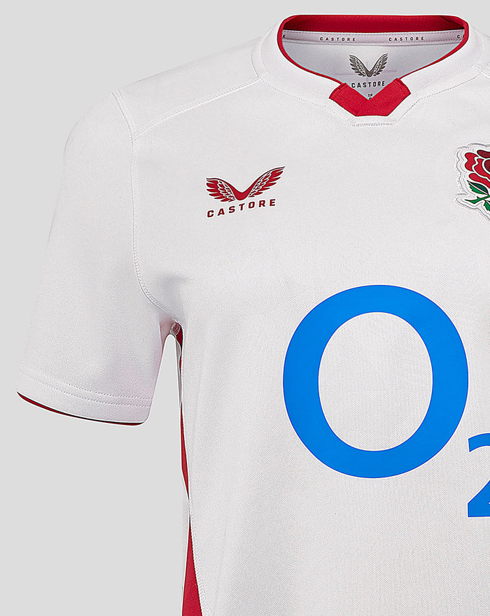 Close-up of white England rugby jersey front showing Castore logo near chest red collar trim and rose crest on opposite chest