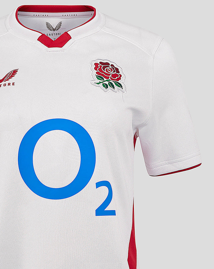 Front view of white England rugby home shirt with crest on chest and bold blue O2 sponsor graphic plus red collar trim