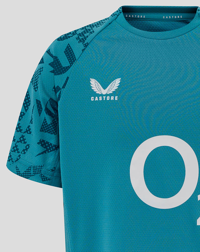 Close up of Storm Blue England Rugby tee chest area showing Castore branding and abstract side panel print