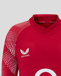 Close up of the red England drill top collar with Castore branding visible on the inside