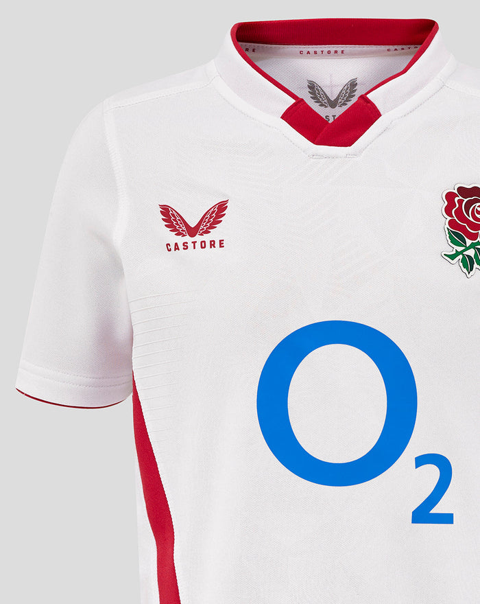 Junior England Rugby Home Pro Shirt in brilliant white with red collar trim, embossed front, rose crest left chest, Castore right chest and large O2 sponsor on front