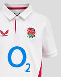 Front close up of white shirt with rose crest on chest Castore logo and large blue O2 sponsor across the front.