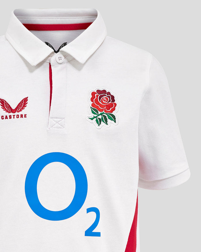 Front close up of white shirt with rose crest on chest Castore logo and large blue O2 sponsor across the front.