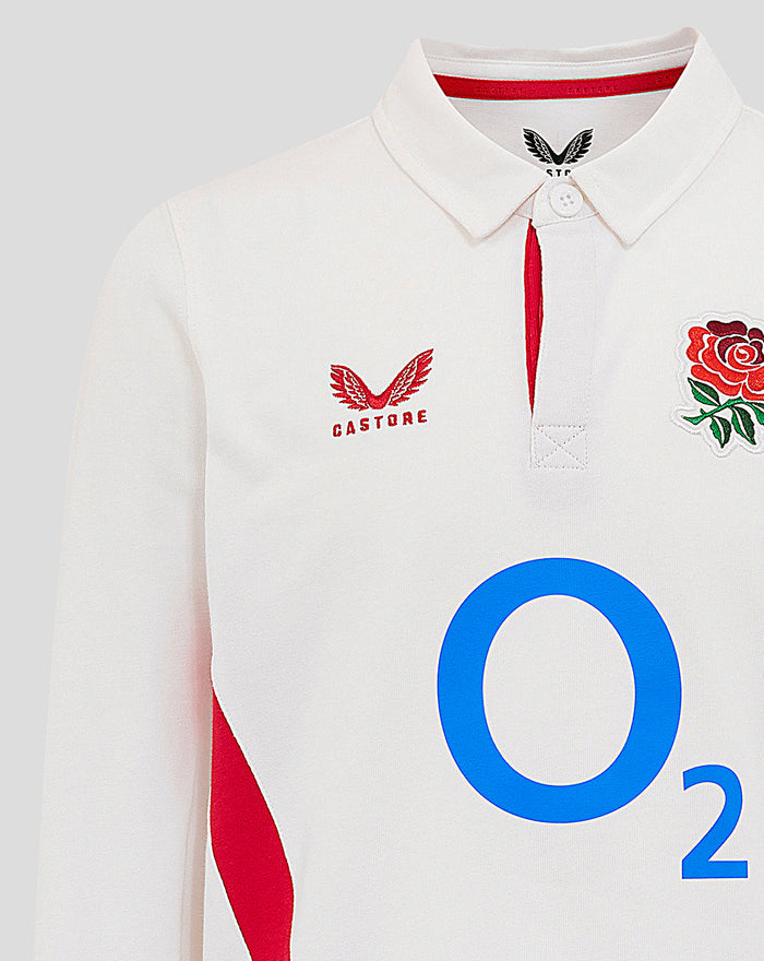 Close-up of the white rugby shirt collar area with red placket, rose crest on the chest and the bold O2 logo.