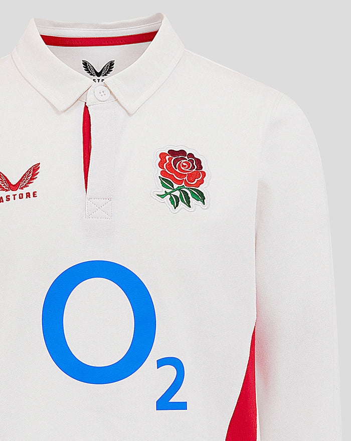 Front view of the white junior England rugby shirt showing the rose crest on the chest, Castore logo and a large O2 sponsor across the front.