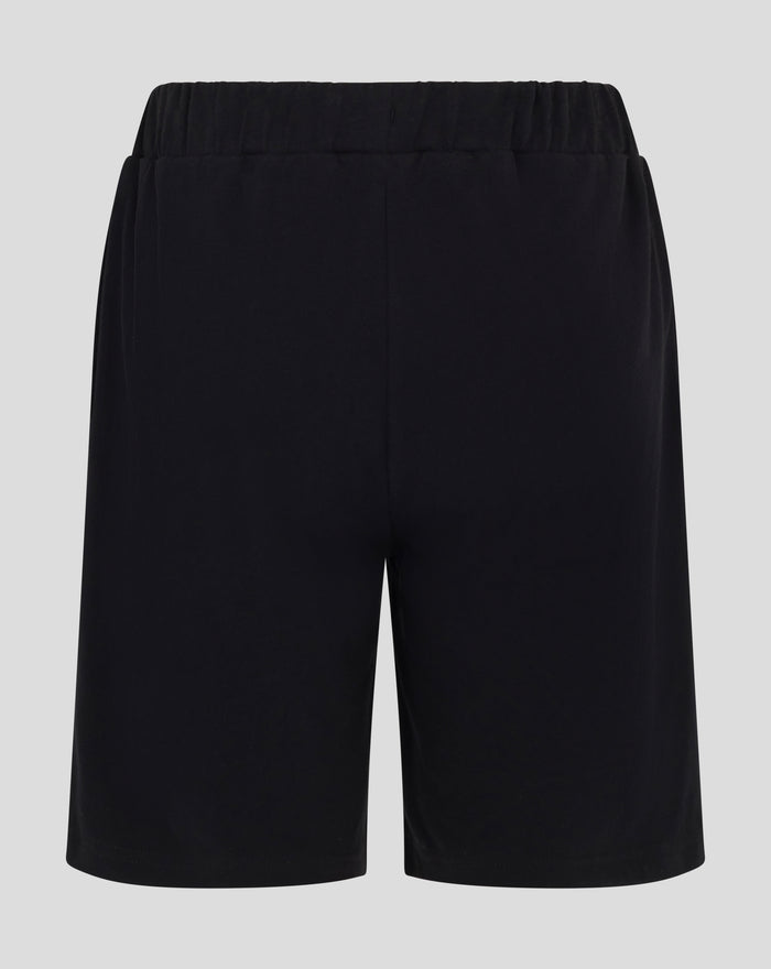 Back view of black junior short pajama shorts with elastic waistband