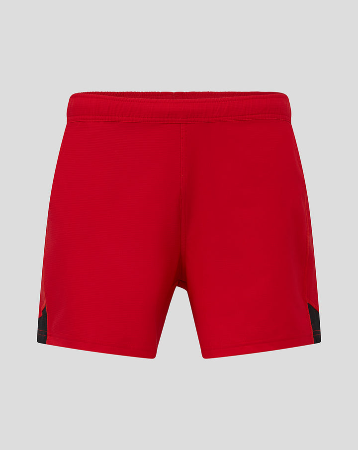 Back view of red pro home shorts with the Trek logo across the rear