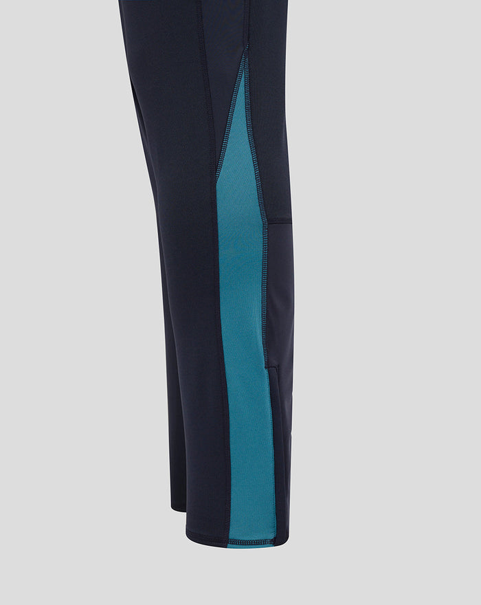 Navy drill pants side view with a bold teal side panel running down the leg.