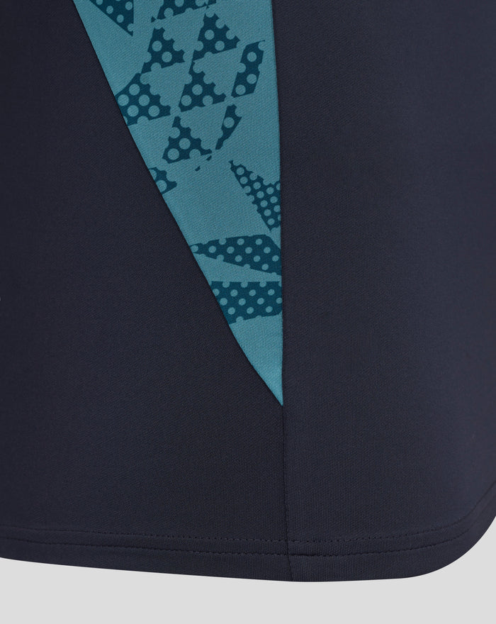 Front close up of navy quarter zip midlayer with rose crest on chest