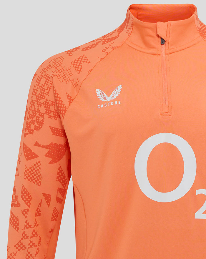 Close-up chest showing rose crest Castore logo and large O2 graphic on Melon midlayer.