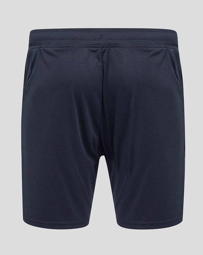 Back view of navy performance knit shorts with elastic waistband