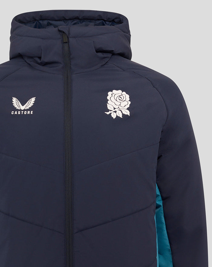 Close-up of chest area on navy England Rugby padded jacket showing Castore logo and rose emblem with zipper
