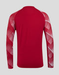 Front view of the red England drill top showing the large white O2 sponsor logo and the rose crest on the chest.