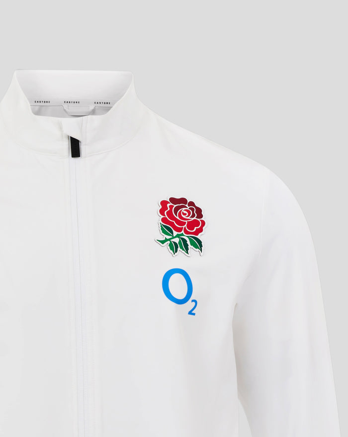 Chest close up of white England Rugby Anthem Jacket showing rose crest and O2 logo on the chest along with Castore branding and zip