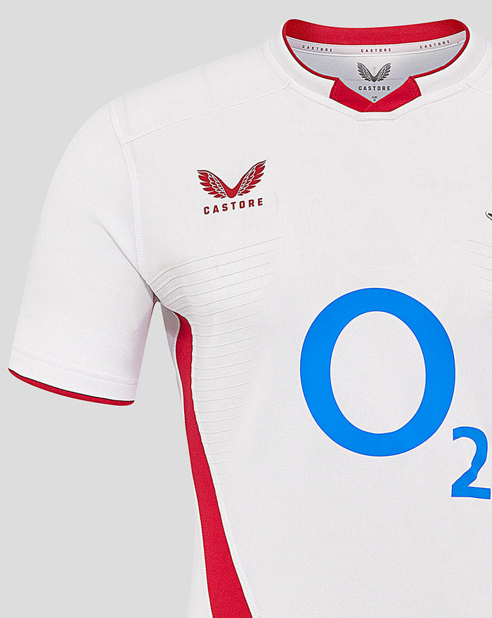 Close up of white England rugby shirt showing the blue O2 logo on the chest and red trim along the side panel.