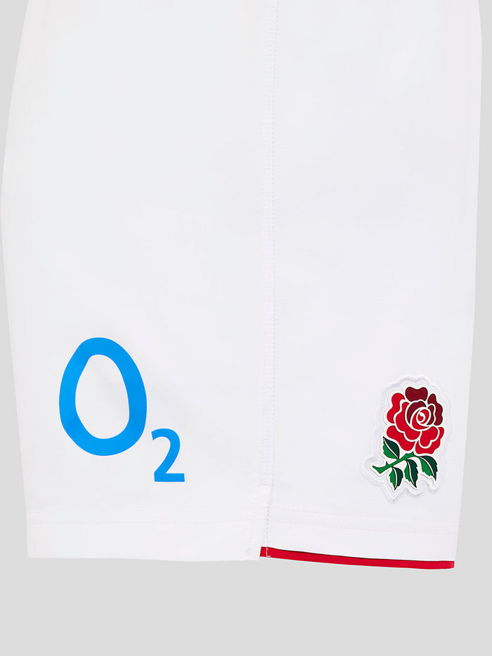 Front view of white England Rugby shorts showing blue O2 logo on left leg and Castore crest near the hem