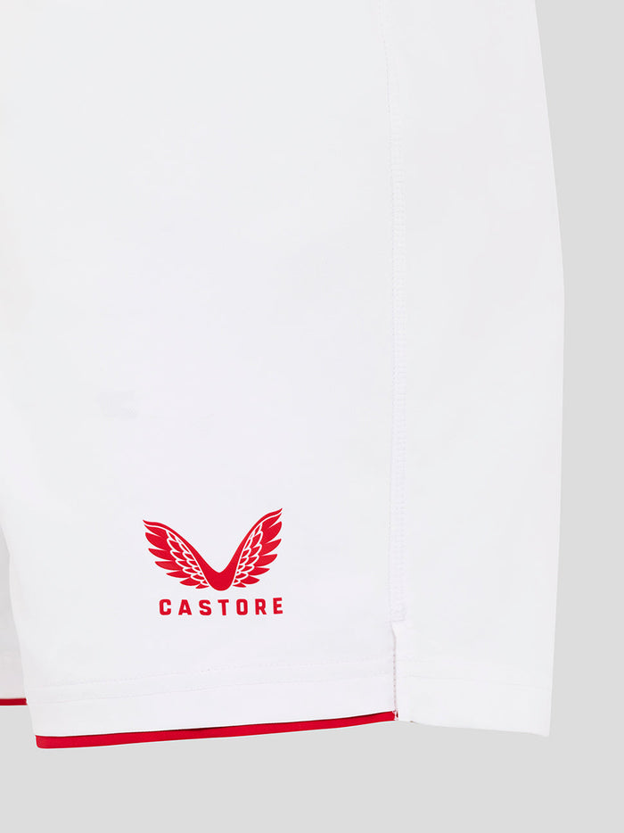 Side view of white England Rugby shorts with blue O2 logo on left leg Castore crest near the hem and red trim along the hem