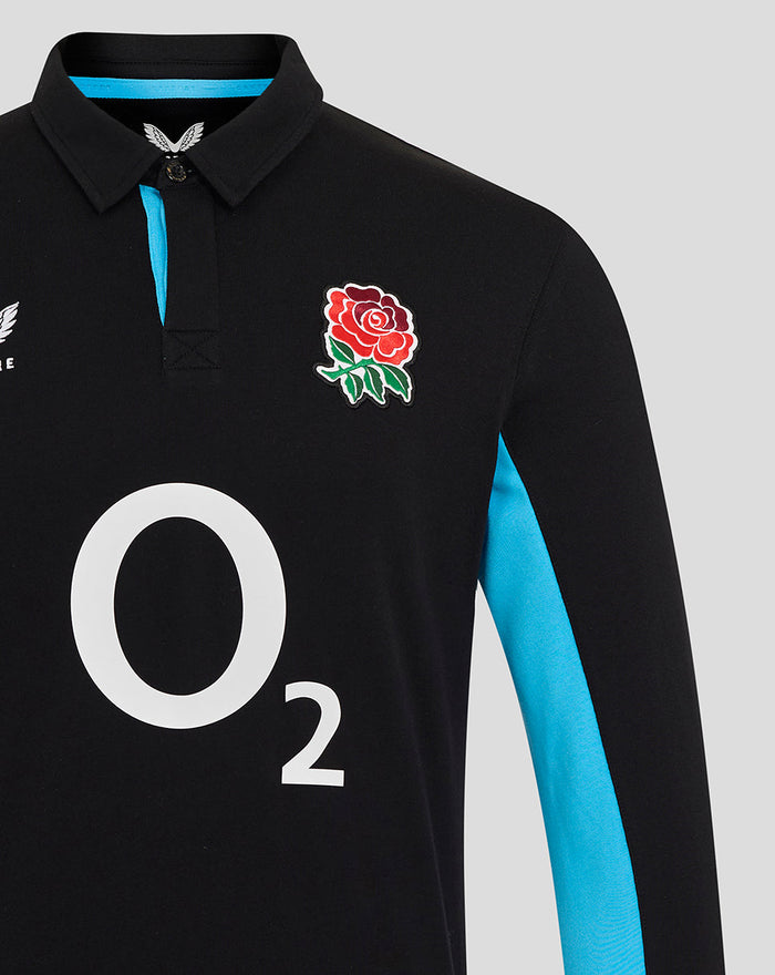 Black England rugby shirt with blue side panels, rose crest on chest, large O2 logo center, Castore badge on chest.