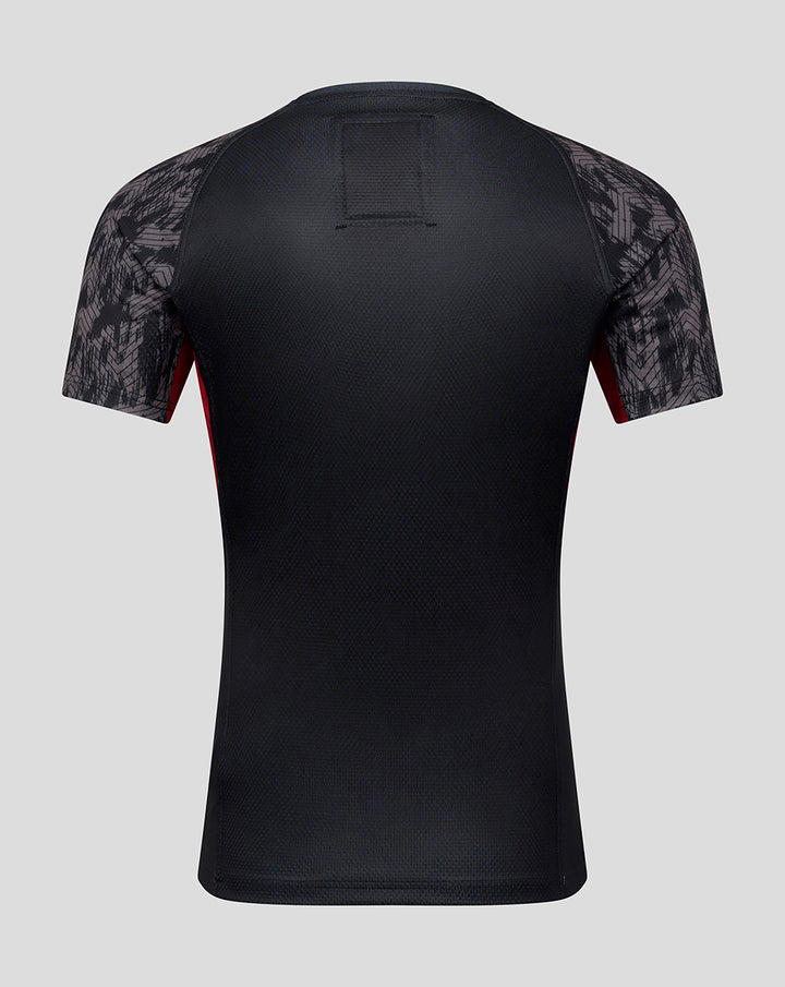 Back view of black Saracens contact short sleeve jersey with textured fabric, patterned sleeves and red side panels