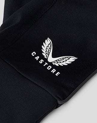 Close up of black Stock Glove cuff with white Castore logo.
